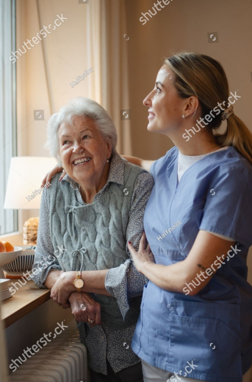 caring-healthcare-worker-visiting-senior-patient-2589911451